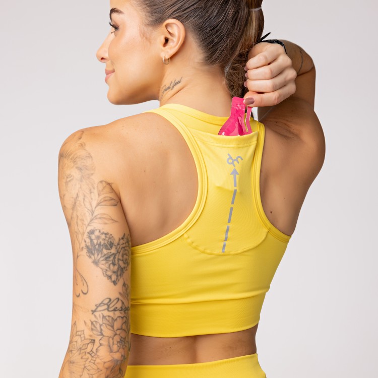 Top Alta Sustentação Baixa Pace com Bolso nas Costas Amarelo