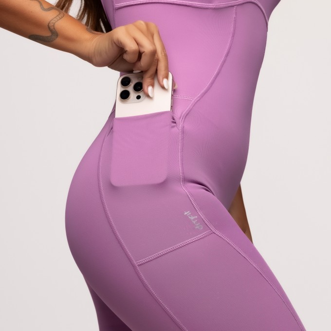 Macacão Fitness Flare Poliamida com Bolsos Laterais Lilás